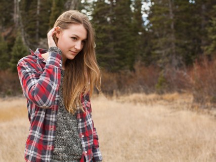 Portrait of young woman in non-urban scene
