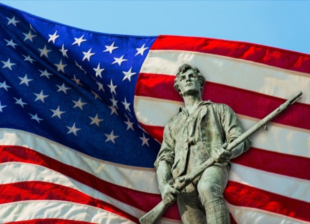 Minutemam statue with flag. Lexington, Massachusetts.