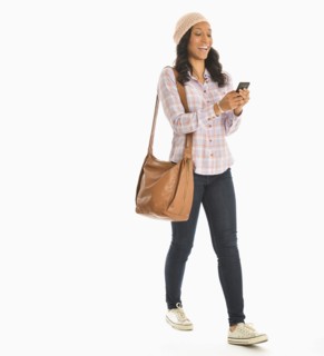 Mid adult woman using phone.