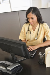 Portrait of female nurse at station.