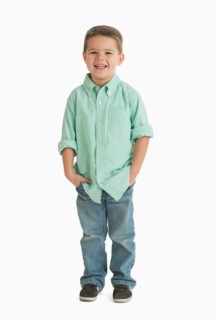 Portrait of boy (4-5) smiling.