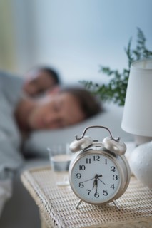 Alarm clock in bedroom.
