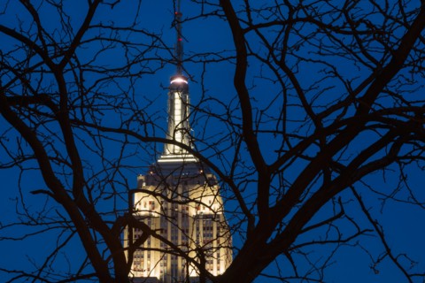 Empire State building illuminated at dusk. New York, New York.