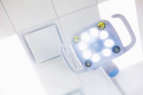 Lamp and ceiling in dentist office.