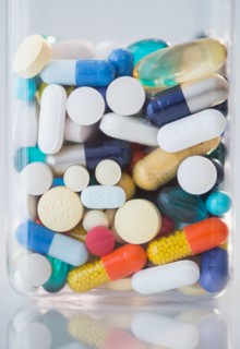 Studio shot of various pills in bottle