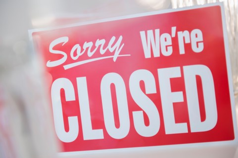 Close-up of closed sign