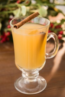 Hot apple cider on table