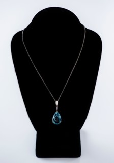Studio shot of beautiful necklace with blue stone