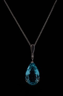 Studio shot of beautiful necklace with blue stone