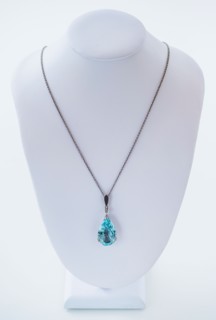 Studio shot of beautiful necklace with blue stone