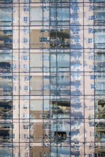 Reflection on glass skyscraper