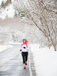 Woman jogging in winter