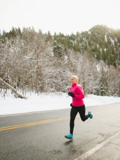 Woman jogging in winter