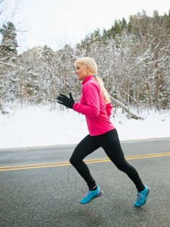 Woman jogging in winter