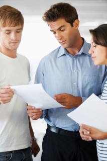 Coworkers doing paperwork