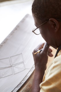 Man concentrating on design