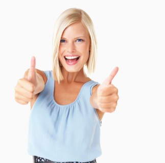 Studio Shot, Portrait of young woman with thumbs up