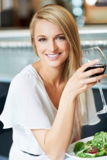 Woman eating lunch in restaurant