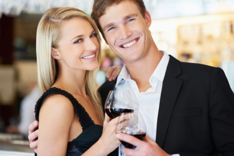 Couple drinking wine in restaurant
