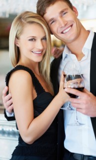 Couple drinking wine in restaurant