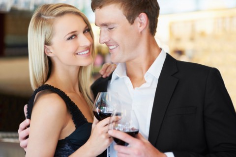 Couple drinking wine in restaurant