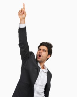 Studio portrait of stylish man cheering