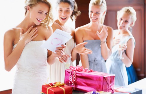 Bride  and bridesmaids unpacking gifts