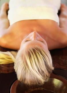 Woman relaxing in spa