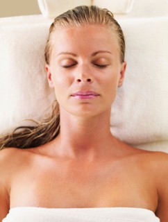 Woman relaxing in spa