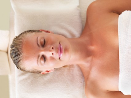 Woman relaxing in spa