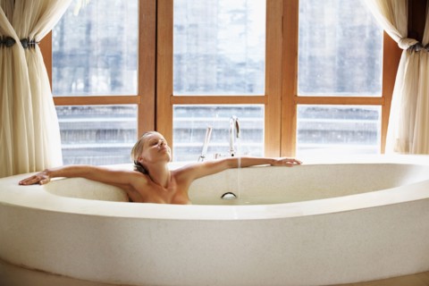 Woman enjoying bath spa