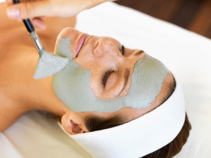 Woman receiving face spa therapy