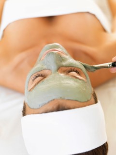 Woman receiving face spa therapy