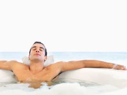 Man relaxing in bathtub