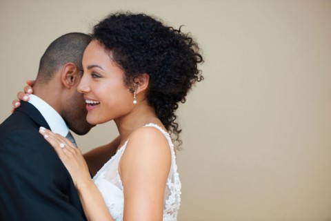 Bride and groom embracing