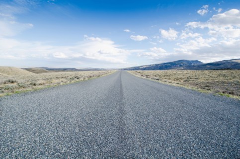 Road going through desolate landscape