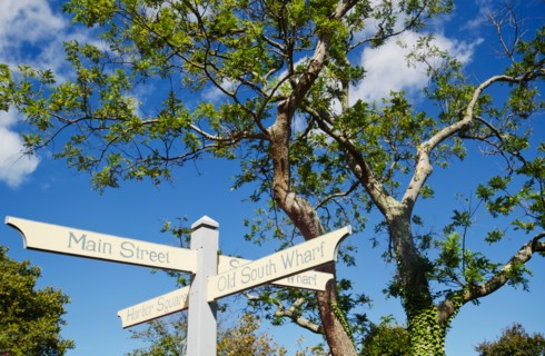 Low angle view of direction signs