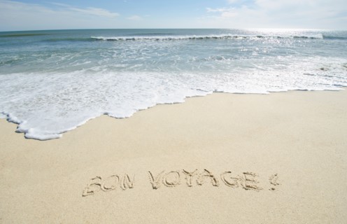 Bon Voyage' note on sand