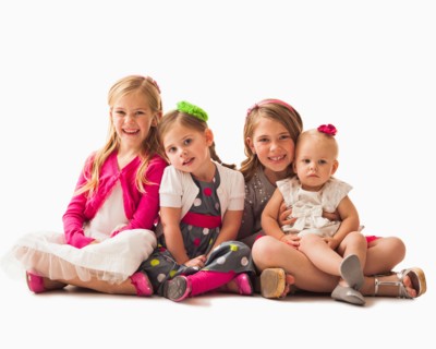 Portrait of four sisters (18-23 months, 2-3, 6-7)