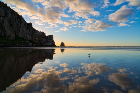 Silhouette of rocks on coast