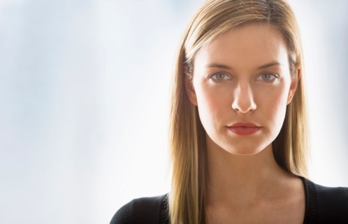Studio portrait of young woman.