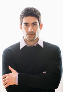 Studio portrait of mid adult man.