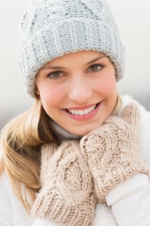Portrait of young woman in winter clothing.