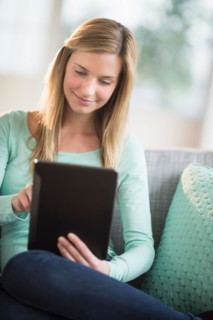 Woman using tablet pc.