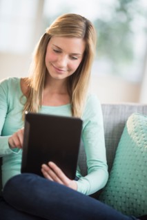 Woman using tablet pc.