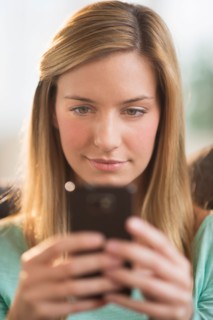 Woman using smartphone.