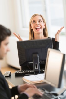 Business man and woman working in office.