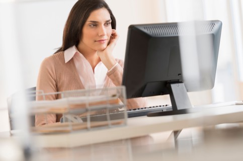 Businesswoman working on computer.