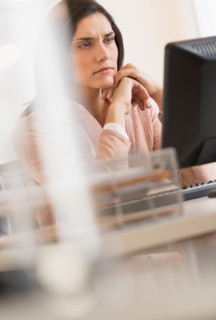 Businesswoman working on computer.