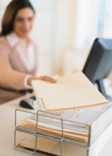 Businesswoman working on computer.